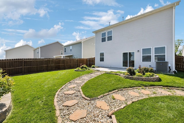 1010 Baltusrol Ln, Lebanon, TN 37087 - rear view of house featuring central AC, a patio, a fenced backyard, a lawn, and a residential view