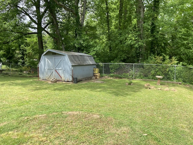 view of shed featuring a fenced backyard