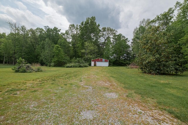 160 Robert E Lee Dr, Manchester, TN 37355 - view of yard featuring a garage and an outdoor structure