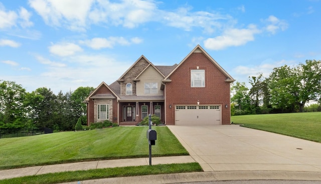 craftsman inspired home with brick siding, concrete driveway, an attached garage, and a front yard