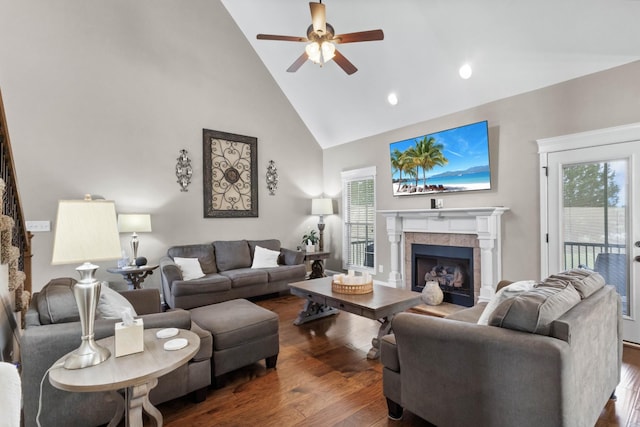 living room featuring high vaulted ceiling, a ceiling fan, dark wood finished floors, healthy amount of natural light, and recessed lighting