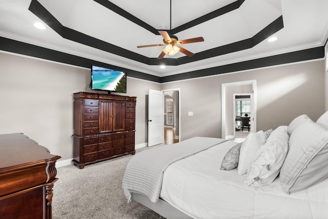 bedroom featuring ornamental molding, carpet floors, a raised ceiling, recessed lighting, and a ceiling fan