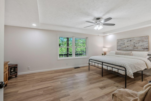 1780 Warren Hollow Rd, Nolensville, TN 37135 - bedroom with a textured ceiling, baseboards, light wood-style flooring, recessed lighting, and a ceiling fan