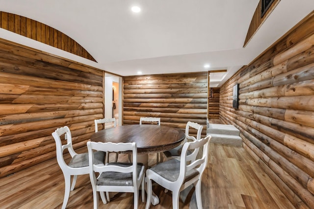 1780 Warren Hollow Rd, Nolensville, TN 37135 - dining space featuring wood finished floors, log walls, and recessed lighting