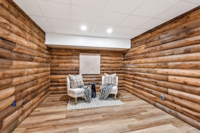 1780 Warren Hollow Rd, Nolensville, TN 37135 - living area featuring recessed lighting, light wood-style floors, log walls, and a drop ceiling