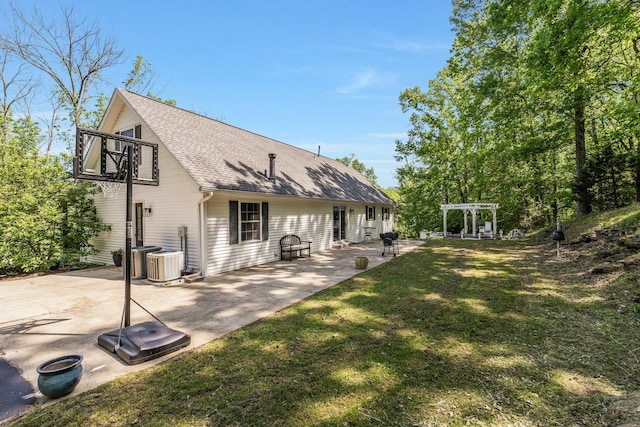 1780 Warren Hollow Rd, Nolensville, TN 37135 - rear view of house featuring a patio area, a pergola, a lawn, and a shingled roof