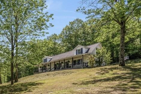 1780 Warren Hollow Rd, Nolensville, TN 37135 - back of house featuring a porch