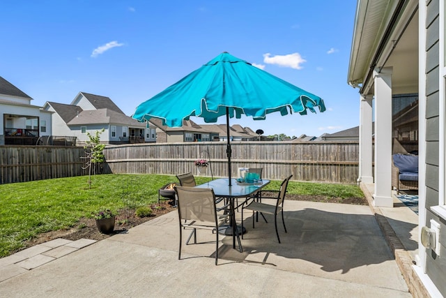 4015 John Marsh Rd, Spring Hill, TN 37174 - view of patio featuring a residential view, outdoor dining area, and a fenced backyard