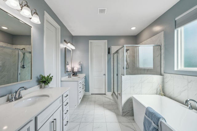 4015 John Marsh Rd, Spring Hill, TN 37174 - bathroom featuring a sink, a shower stall, marble finish floor, and visible vents