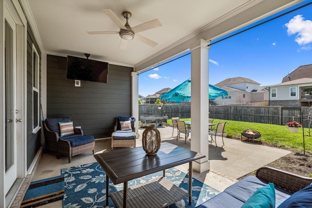 4015 John Marsh Rd, Spring Hill, TN 37174 - view of patio with a ceiling fan, a fenced backyard, and an outdoor living space with a fire pit