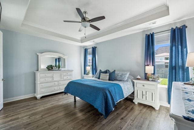 4015 John Marsh Rd, Spring Hill, TN 37174 - bedroom featuring a raised ceiling, multiple windows, ornamental molding, and wood finished floors