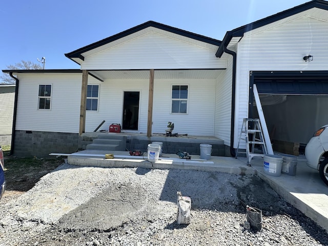 back of house with covered porch