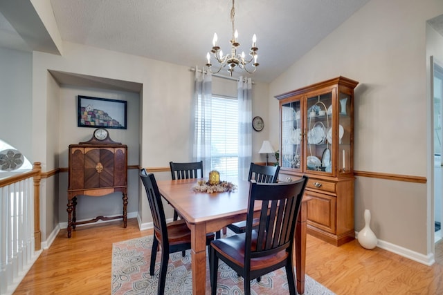 2510 Port Kembla Dr, Mount Juliet, TN 37122 - dining room featuring light wood-style floors, baseboards, lofted ceiling, and an inviting chandelier