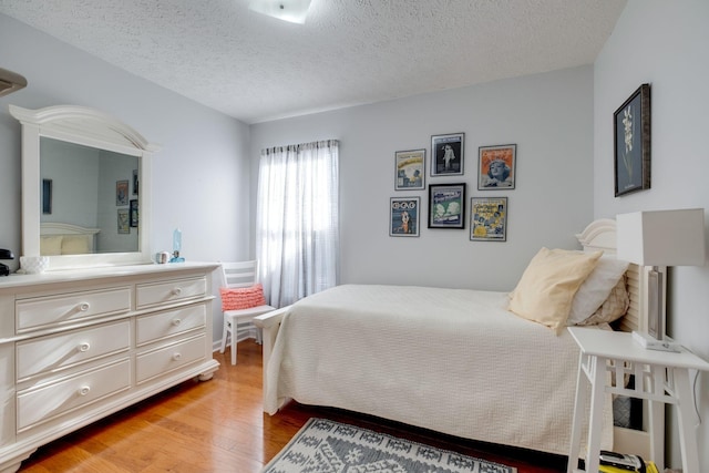 2510 Port Kembla Dr, Mount Juliet, TN 37122 - bedroom with light wood-type flooring and a textured ceiling