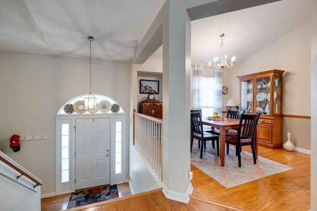 2510 Port Kembla Dr, Mount Juliet, TN 37122 - entrance foyer with baseboards, light wood-style flooring, lofted ceiling, and a chandelier