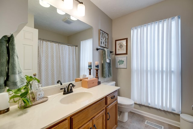 2510 Port Kembla Dr, Mount Juliet, TN 37122 - bathroom with vanity, a shower with shower curtain, toilet, and visible vents