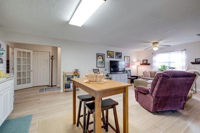 2510 Port Kembla Dr, Mount Juliet, TN 37122 - living room with ceiling fan, light wood-style flooring, a textured ceiling, and visible vents