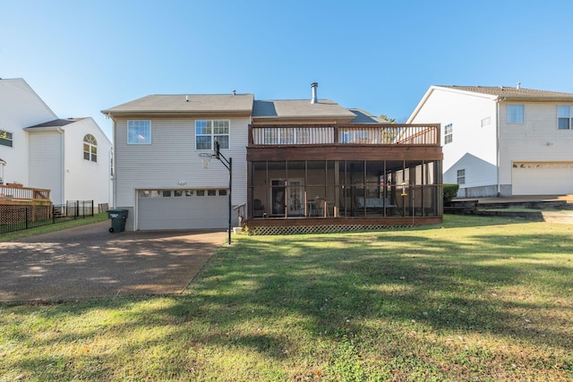 2510 Port Kembla Dr, Mount Juliet, TN 37122 - rear view of property with a lawn, aphalt driveway, a sunroom, and a garage