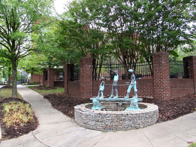 surrounding community featuring fence