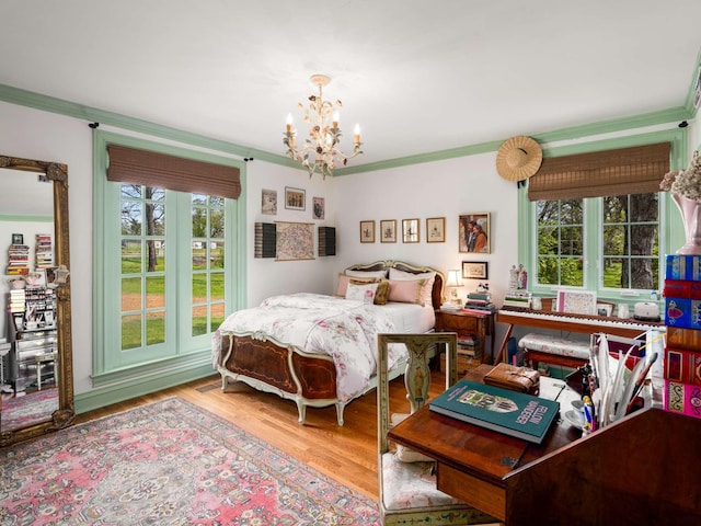305 Davidson Rd, Nashville, TN 37205 - bedroom with an inviting chandelier, crown molding, and wood finished floors