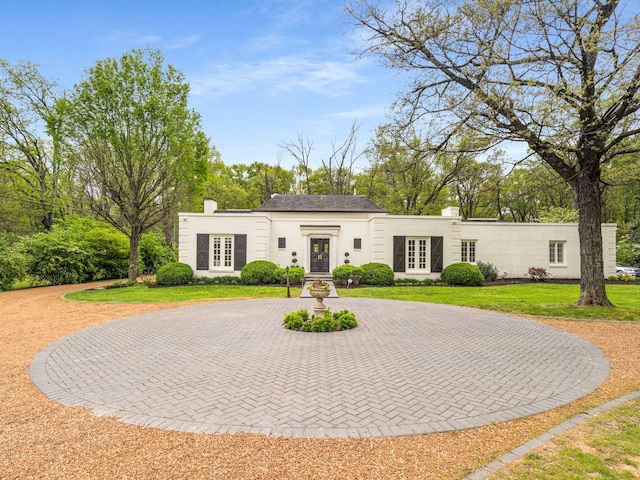 305 Davidson Rd, Nashville, TN 37205 - view of front of house with french doors, curved driveway, a chimney, and a front yard