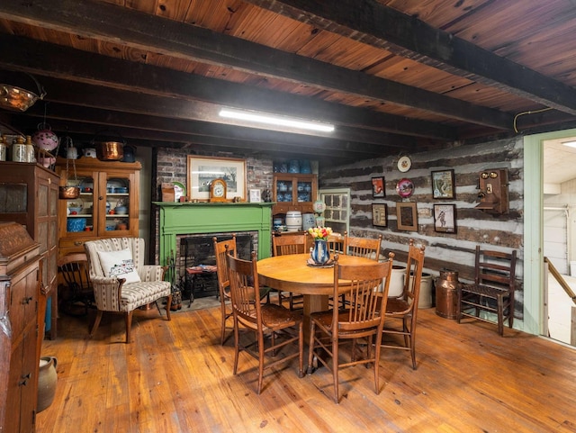 305 Davidson Rd, Nashville, TN 37205 - dining area featuring beam ceiling, hardwood / wood-style floors, and a fireplace