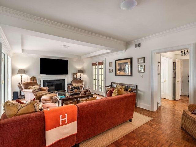 305 Davidson Rd, Nashville, TN 37205 - living area featuring visible vents, crown molding, a glass covered fireplace, baseboards, and a raised ceiling
