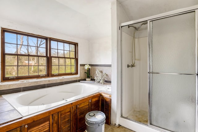 5506 Lickton Pike, Goodlettsville, TN 37072 - bathroom with tile patterned flooring, a shower stall, and a tub with jets