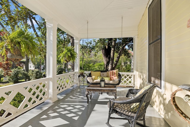 balcony featuring a porch