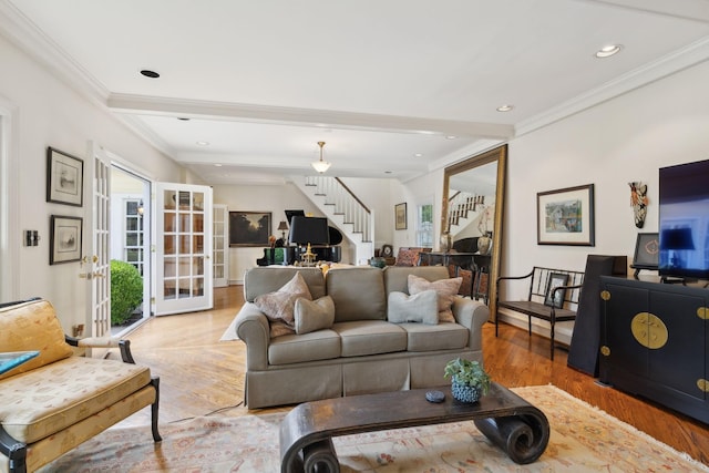 living area with stairway, crown molding, recessed lighting, and wood finished floors
