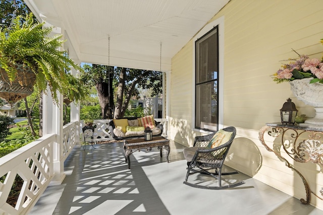 balcony featuring a porch