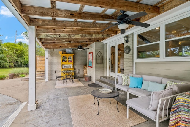 view of patio featuring ceiling fan and an outdoor living space