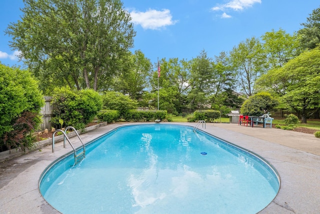 pool featuring fence