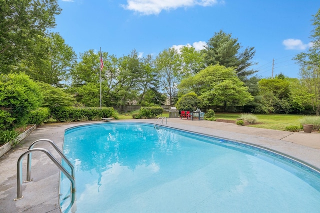 pool featuring fence