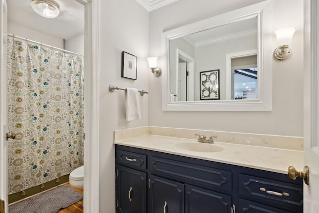 full bath with vanity, ornamental molding, curtained shower, and toilet
