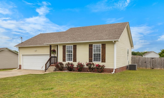 single story home featuring fence, a front lawn, driveway, and central AC