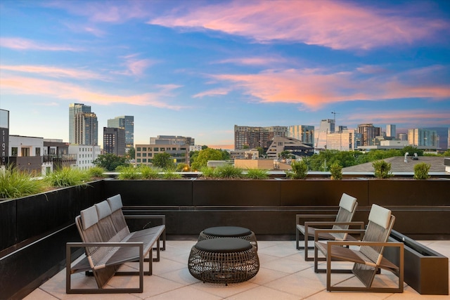 1014 16th Ave S Unit 202, Nashville, TN 37212 - patio terrace at dusk featuring a city view