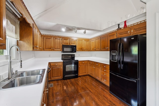141 Crestview Dr, Lewisburg, TN 37091 - kitchen with black appliances, a sink, rail lighting, dark wood-style flooring, and brown cabinetry