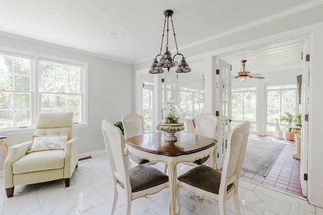 dining room featuring a ceiling fan, baseboards, ornamental molding, and marble finish floor