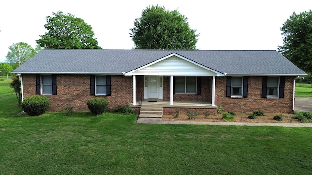 255 Douglas Ln, Gallatin, TN 37066 - ranch-style home with brick siding, a shingled roof, and covered porch
