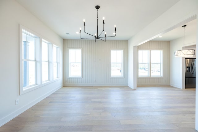 4060 Penfield Dr Unit E, Franklin, TN 37069 - unfurnished dining area featuring baseboards, a chandelier, and light wood-type flooring