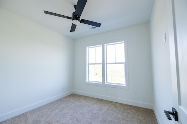 4060 Penfield Dr Unit E, Franklin, TN 37069 - empty room with visible vents, baseboards, and light carpet