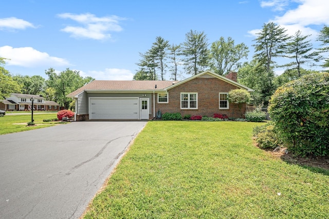 533 Mckaig Rd, Murfreesboro, TN 37127 - ranch-style home featuring brick siding, a garage, aphalt driveway, a front yard, and a chimney