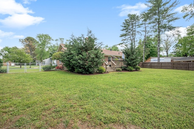 533 Mckaig Rd, Murfreesboro, TN 37127 - view of yard with a fenced backyard, a gate, and a deck