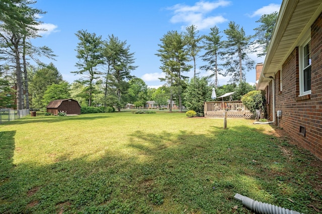 533 Mckaig Rd, Murfreesboro, TN 37127 - view of yard with a storage shed, fence, a wooden deck, and an outdoor structure