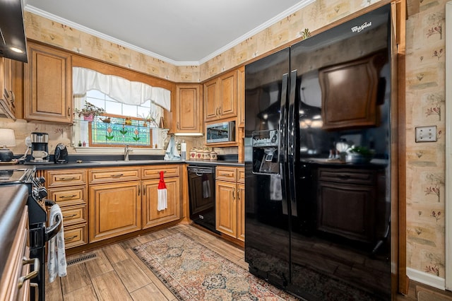 533 Mckaig Rd, Murfreesboro, TN 37127 - kitchen with brown cabinets, dark countertops, a sink, extractor fan, and black appliances