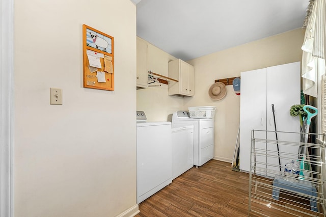 533 Mckaig Rd, Murfreesboro, TN 37127 - clothes washing area featuring cabinet space, separate washer and dryer, baseboards, and dark wood-type flooring
