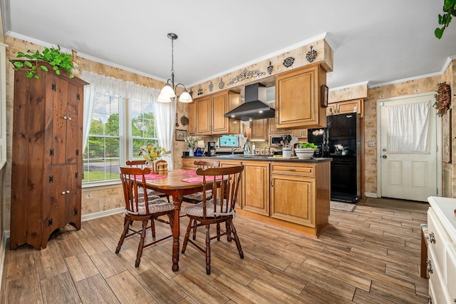 533 Mckaig Rd, Murfreesboro, TN 37127 - kitchen featuring crown molding, freestanding refrigerator, wood finished floors, dark countertops, and wall chimney range hood