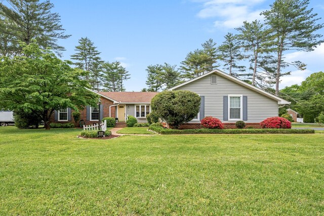 533 Mckaig Rd, Murfreesboro, TN 37127 - ranch-style house featuring brick siding and a front lawn