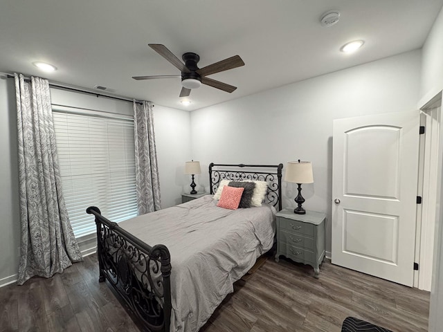 bedroom featuring dark wood-type flooring, recessed lighting, and ceiling fan